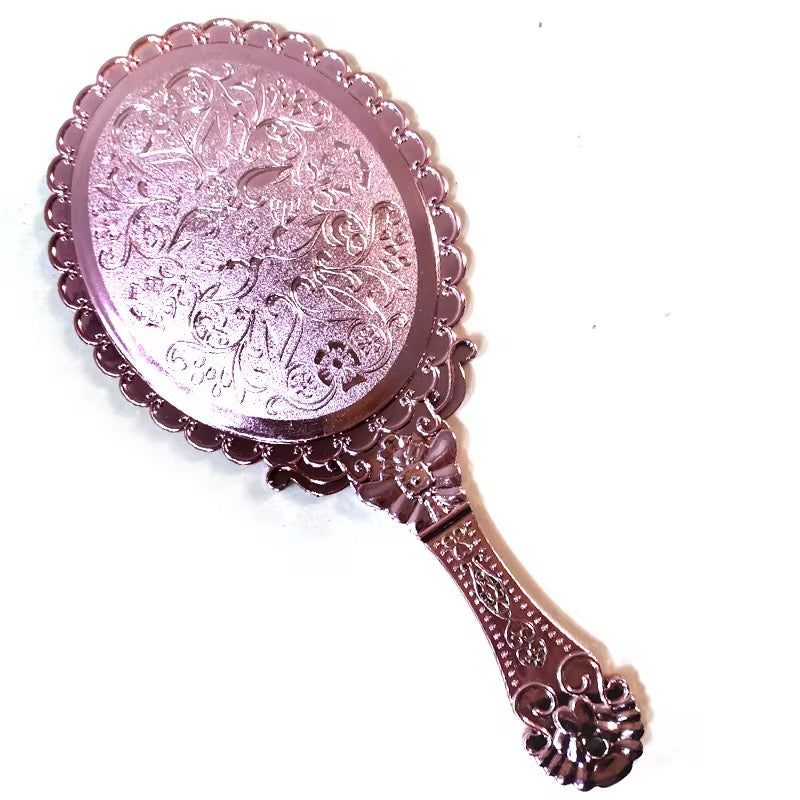 Hold Beauty—Frame Grace Vintage Handheld Mirror – Elegance in Every Detail Crafted with a sculpted plastic frame