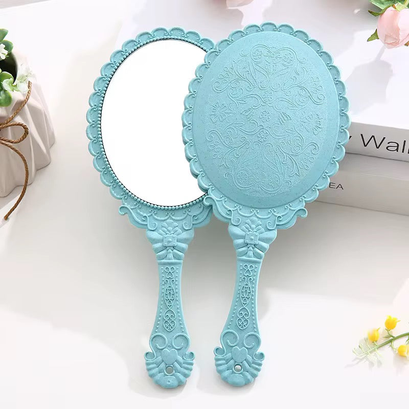 Hold Beauty—Frame Grace Vintage Handheld Mirror – Elegance in Every Detail Crafted with a sculpted plastic frame