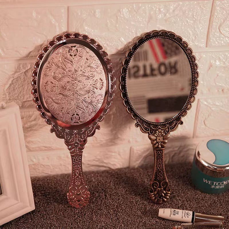 Hold Beauty—Frame Grace Vintage Handheld Mirror – Elegance in Every Detail Crafted with a sculpted plastic frame