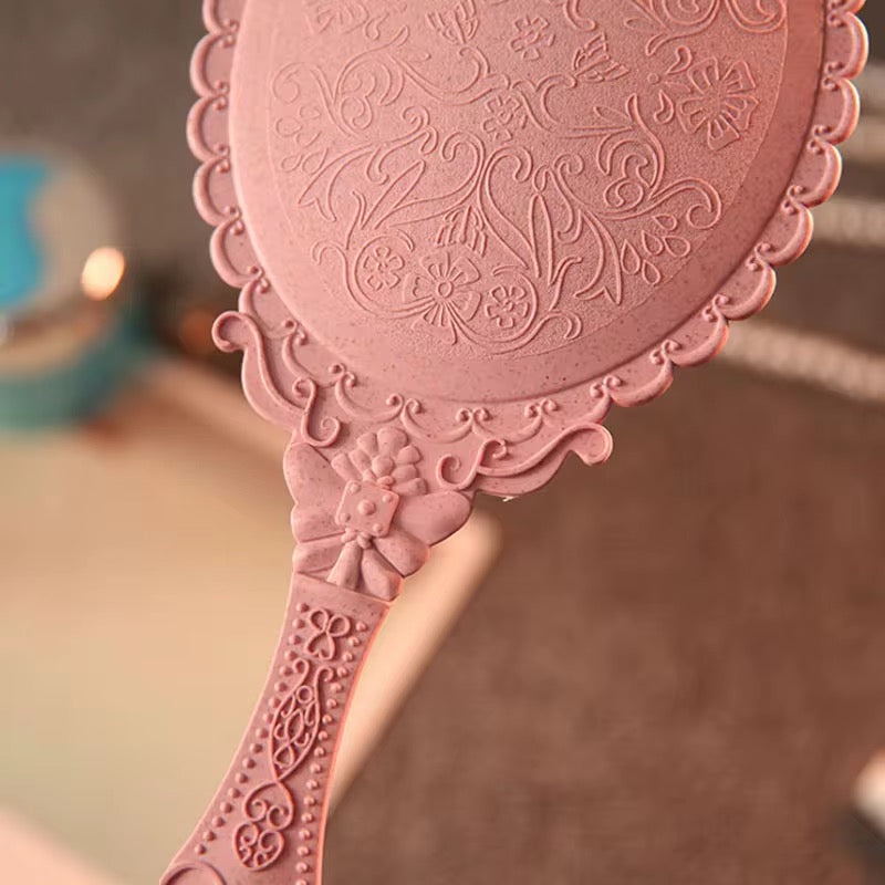 Hold Beauty—Frame Grace Vintage Handheld Mirror – Elegance in Every Detail Crafted with a sculpted plastic frame